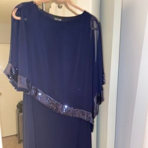 Long blue dress with slit and overlay